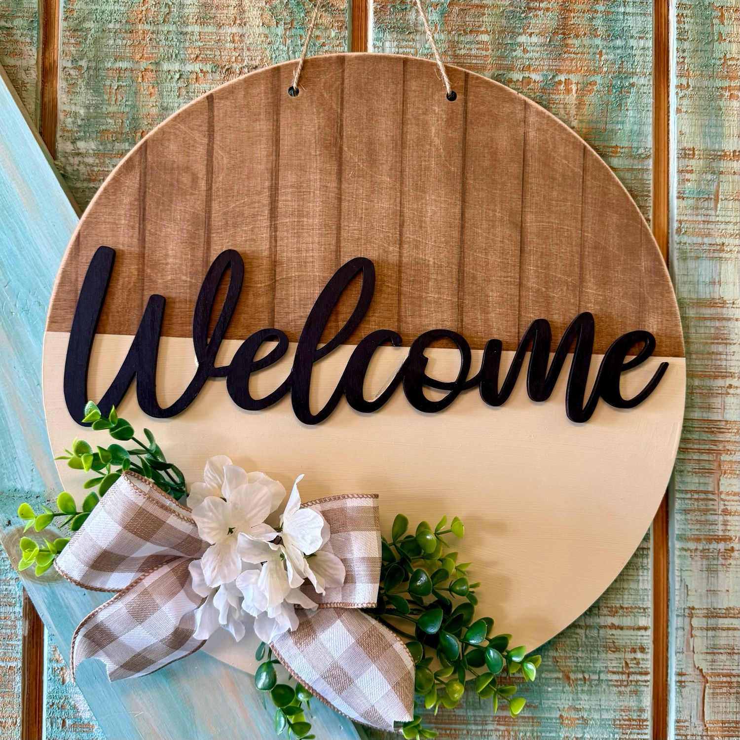 welcome sign with flowers